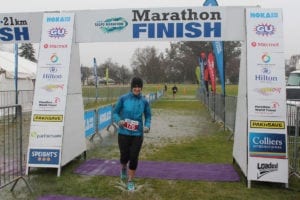 Dee crosses Finish Line Taupo Marathon