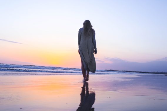 Woman-walking-on-the-beach