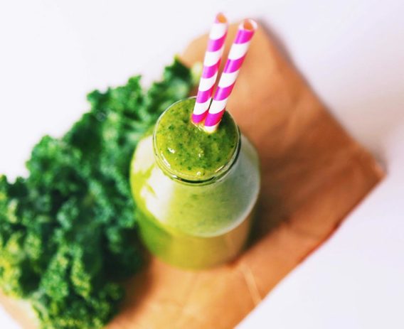 green smoothie in glass with vegetables
